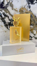 Shaheen EDP 100ml frasco dorado con halcón y caja blanca dorada