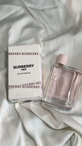 Burberry Her EDP 100ml frasco transparente con tapa rosa pálido